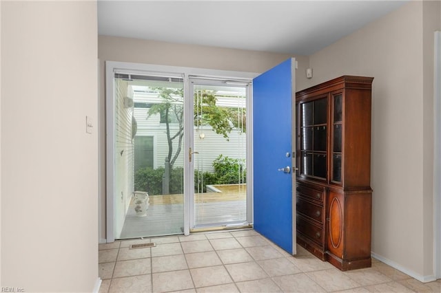 4249 Cheswick Ln, Virginia Beach, VA 23455 - entryway with light tile patterned floors and baseboards