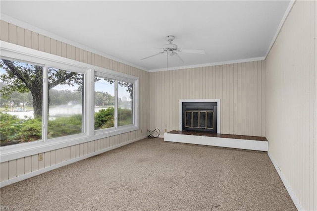 4249 Cheswick Ln, Virginia Beach, VA 23455 - unfurnished living room with crown molding, carpet flooring, a ceiling fan, and a glass covered fireplace