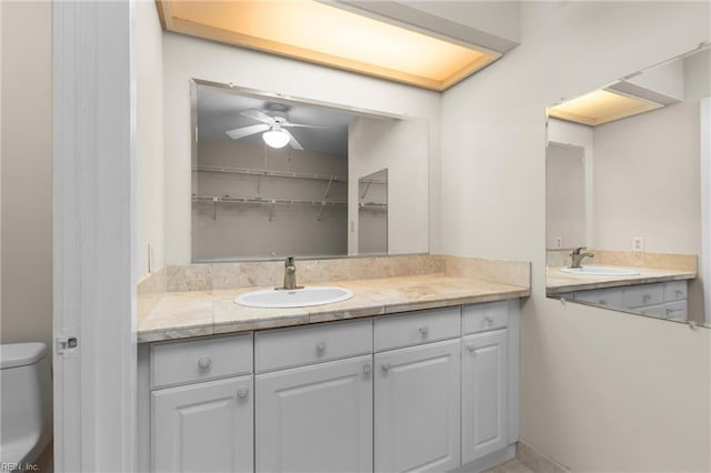 4249 Cheswick Ln, Virginia Beach, VA 23455 - bathroom with toilet, vanity, and a ceiling fan