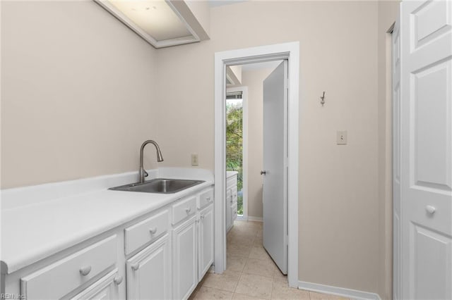 4249 Cheswick Ln, Virginia Beach, VA 23455 - washroom featuring a sink, baseboards, and light tile patterned flooring