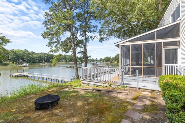4249 Cheswick Ln, Virginia Beach, VA 23455 - view of yard featuring a sunroom, a fire pit, a dock, and a water view