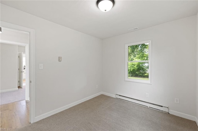 2600 Eastwood Ave, Chesapeake, VA 23324 - unfurnished room with a baseboard heating unit, baseboards, and carpet