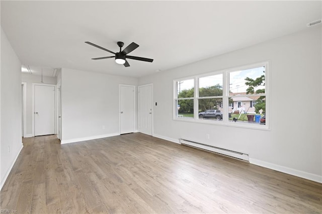 2600 Eastwood Ave, Chesapeake, VA 23324 - empty room featuring attic access, baseboard heating, a ceiling fan, and wood finished floors