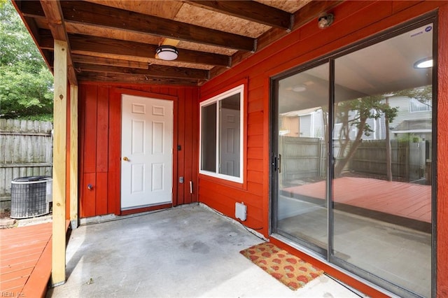 4321 Moosewood Ct, Virginia Beach, VA 23462 - view of exterior entry featuring central AC and board and batten siding