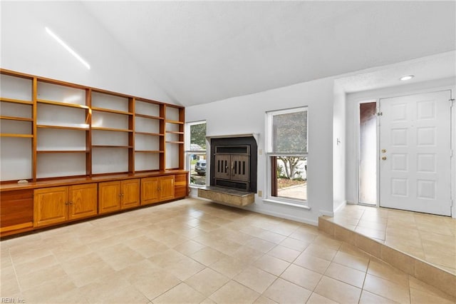 4321 Moosewood Ct, Virginia Beach, VA 23462 - unfurnished living room featuring light tile patterned flooring, a fireplace with raised hearth, and high vaulted ceiling