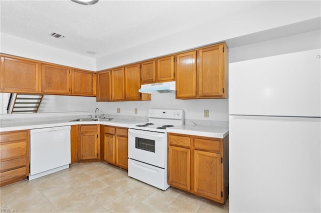 4321 Moosewood Ct, Virginia Beach, VA 23462 - kitchen with white appliances, under cabinet range hood, a sink, light countertops, and brown cabinetry