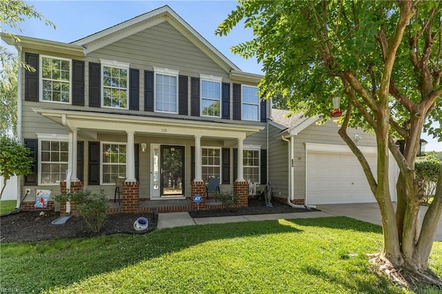115 Rochdale Ln, Suffolk, VA 23434 - view of front of house featuring covered porch, a front lawn, driveway, and a garage