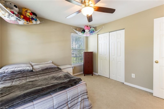 115 Rochdale Ln, Suffolk, VA 23434 - carpeted bedroom featuring a closet, baseboards, and ceiling fan