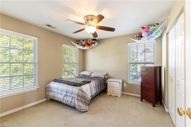 115 Rochdale Ln, Suffolk, VA 23434 - bedroom featuring multiple windows and light carpet