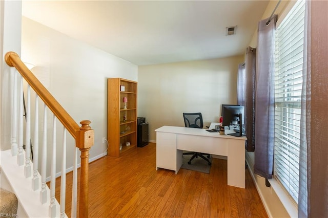 115 Rochdale Ln, Suffolk, VA 23434 - office space with light wood-style floors, plenty of natural light, and baseboards