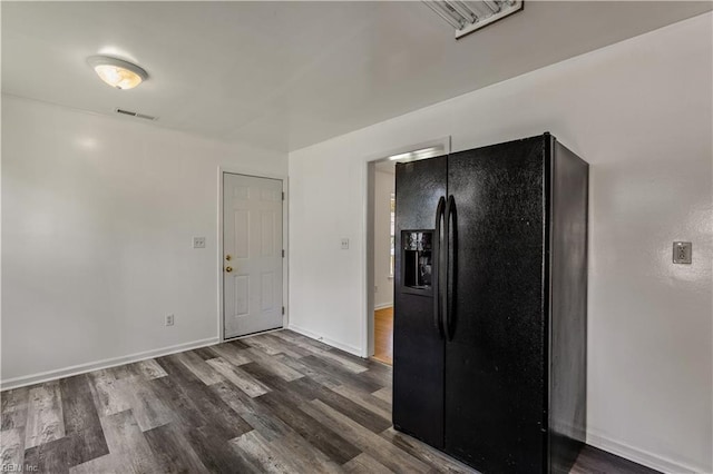 5036 John St, Chesapeake, VA 23321 - kitchen with black fridge with ice dispenser, dark wood finished floors, and baseboards