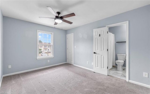 306 San Roman Dr, Chesapeake, VA 23322 - unfurnished bedroom featuring carpet floors, connected bathroom, baseboards, and a ceiling fan