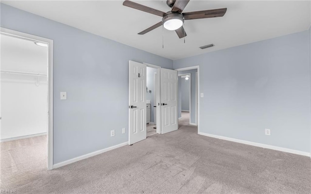 306 San Roman Dr, Chesapeake, VA 23322 - unfurnished bedroom featuring carpet floors, a spacious closet, a closet, baseboards, and ceiling fan