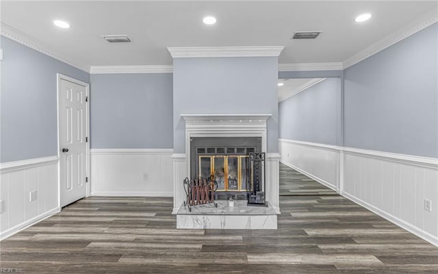 306 San Roman Dr, Chesapeake, VA 23322 - unfurnished living room featuring wood finished floors, a wainscoted wall, a decorative wall, ornamental molding, and a glass covered fireplace