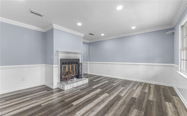 306 San Roman Dr, Chesapeake, VA 23322 - unfurnished living room with wood finished floors, wainscoting, recessed lighting, ornamental molding, and a glass covered fireplace