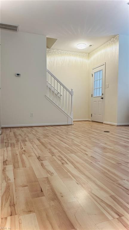 1107 Halton Ln, Chesapeake, VA 23320 - entrance foyer with light wood finished floors, stairway, and baseboards