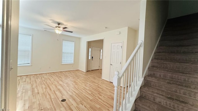 1107 Halton Ln, Chesapeake, VA 23320 - stairs with a ceiling fan, wood finished floors, and baseboards