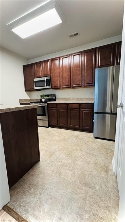 1107 Halton Ln, Chesapeake, VA 23320 - kitchen featuring stainless steel appliances and light countertops
