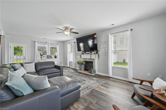 5520 White Swallow Way, Chesapeake, VA 23321 - living area featuring a fireplace with flush hearth, a ceiling fan, dark wood-style floors, and baseboards