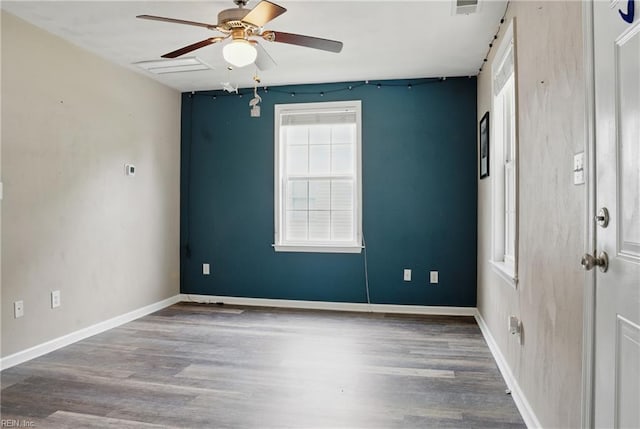 6412 Dove St, Norfolk, VA 23513 - spare room with a ceiling fan, wood finished floors, and baseboards