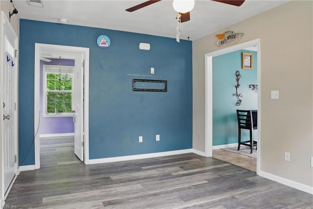 6412 Dove St, Norfolk, VA 23513 - empty room featuring a ceiling fan, wood finished floors, baseboards, and a smoke detector