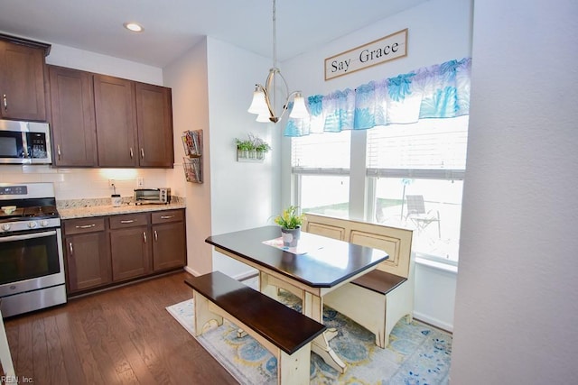 205 Markham St, Suffolk, VA 23435 - kitchen with appliances with stainless steel finishes, healthy amount of natural light, dark wood-style floors, dark brown cabinetry, and recessed lighting