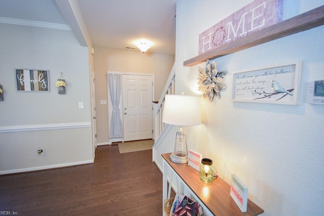 205 Markham St, Suffolk, VA 23435 - foyer with wood finished floors, stairway, crown molding, and baseboards