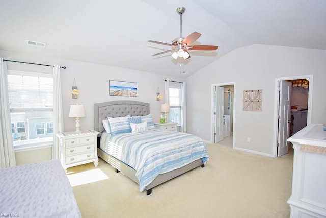 205 Markham St, Suffolk, VA 23435 - bedroom with vaulted ceiling, a walk in closet, light colored carpet, multiple windows, and baseboards