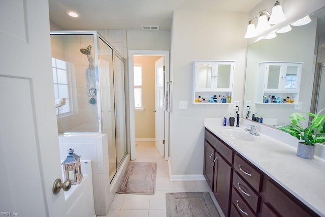 205 Markham St, Suffolk, VA 23435 - full bathroom with vanity, tile patterned flooring, a stall shower, baseboards, and recessed lighting