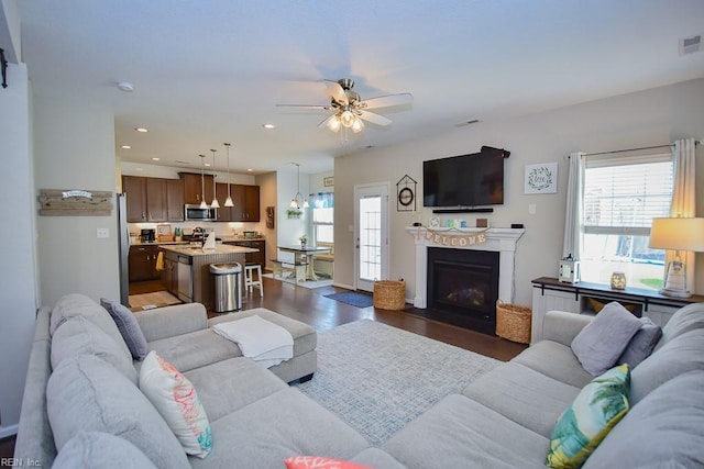 205 Markham St, Suffolk, VA 23435 - living room featuring ceiling fan, wood finished floors, a fireplace with flush hearth, and recessed lighting