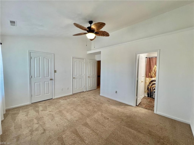 728 S Lake Cir, Chesapeake, VA 23322 - unfurnished bedroom with lofted ceiling, carpet floors, baseboards, and ensuite bath