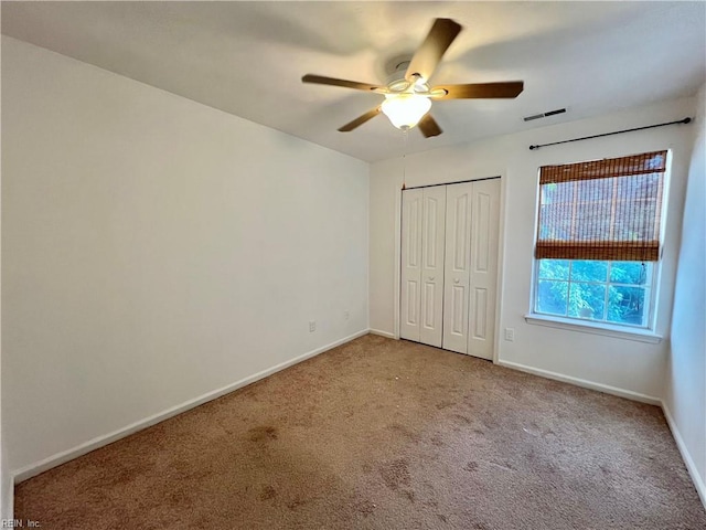 728 S Lake Cir, Chesapeake, VA 23322 - unfurnished bedroom with carpet flooring, baseboards, a closet, and a ceiling fan