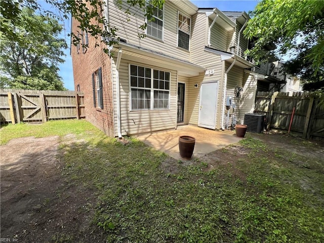 728 S Lake Cir, Chesapeake, VA 23322 - rear view of house featuring a patio, a fenced backyard, and central AC