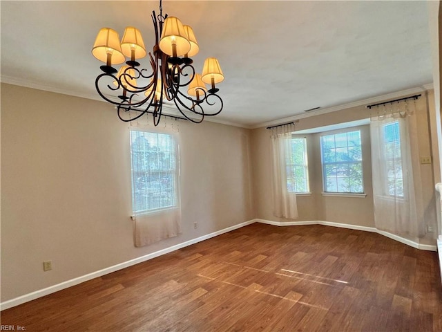 728 S Lake Cir, Chesapeake, VA 23322 - unfurnished room featuring crown molding, wood finished floors, a chandelier, and baseboards