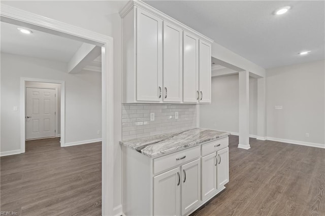 143 Highland Pony Dr, Hertford, NC 27944 - kitchen with baseboards, white cabinets, wood finished floors, recessed lighting, and backsplash