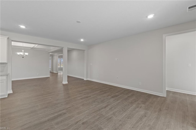 143 Highland Pony Dr, Hertford, NC 27944 - below grade area featuring baseboards, wood finished floors, recessed lighting, and a chandelier