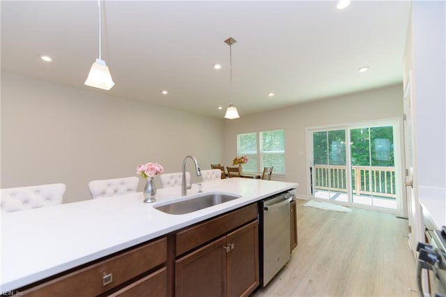 123 Big Woods Dr, Poquoson, VA 23662 - kitchen with a sink, dishwasher, light countertops, decorative light fixtures, and recessed lighting