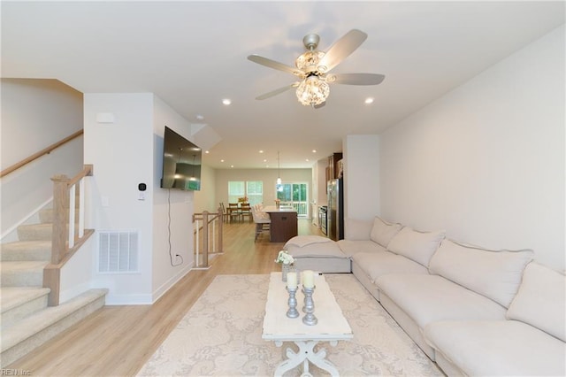 123 Big Woods Dr, Poquoson, VA 23662 - living room featuring light wood-style flooring, a ceiling fan, recessed lighting, and baseboards