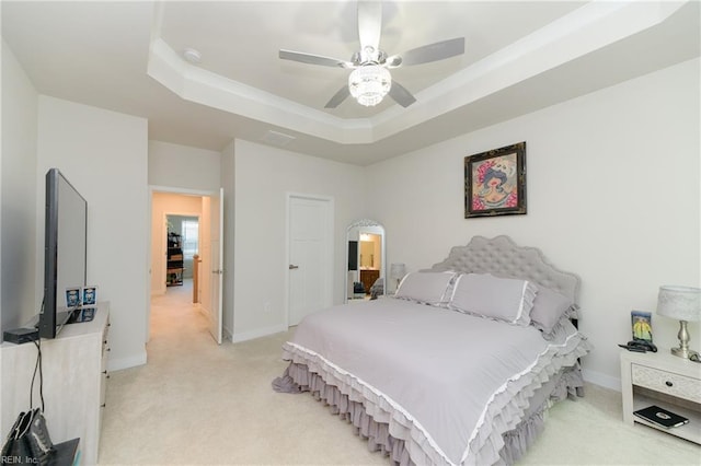 123 Big Woods Dr, Poquoson, VA 23662 - bedroom with light colored carpet, a raised ceiling, baseboards, and ceiling fan