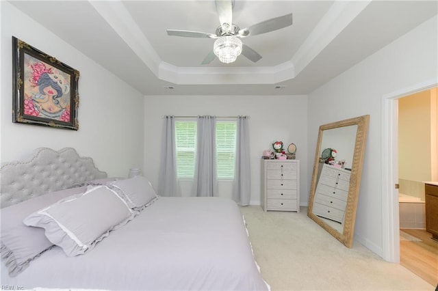 123 Big Woods Dr, Poquoson, VA 23662 - bedroom featuring a raised ceiling, light colored carpet, a ceiling fan, baseboards, and ensuite bathroom