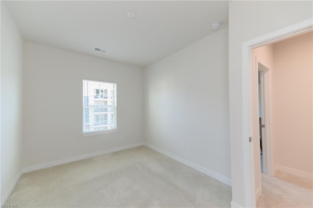 123 Big Woods Dr, Poquoson, VA 23662 - spare room with light colored carpet, a smoke detector, and baseboards