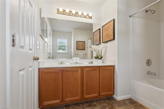 408 Holmes Blvd, Yorktown, VA 23692 - full bath with double vanity, shower / washtub combination, and baseboards