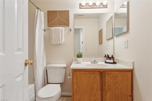 408 Holmes Blvd, Yorktown, VA 23692 - full bath with toilet, vanity, and shower / bath combo with shower curtain