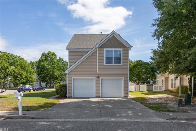 408 Holmes Blvd, Yorktown, VA 23692 - traditional-style house featuring an attached garage and concrete driveway
