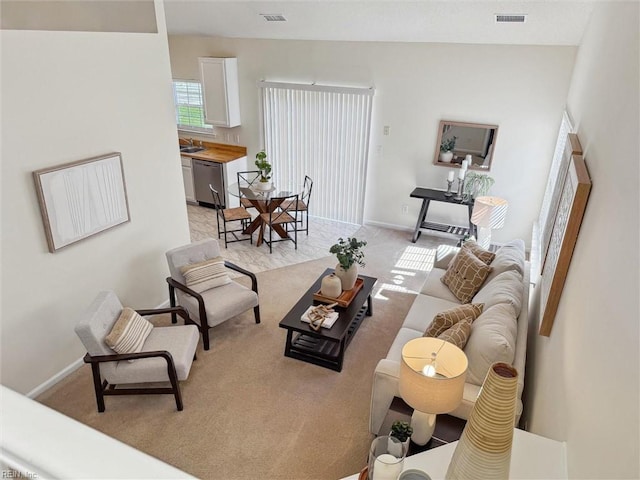 408 Holmes Blvd, Yorktown, VA 23692 - living room with light carpet and baseboards