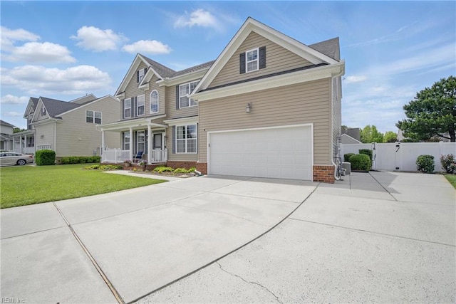 1200 Althea Ct, Chesapeake, VA 23322 - view of front facade with brick siding, covered porch, an attached garage, a gate, and concrete driveway