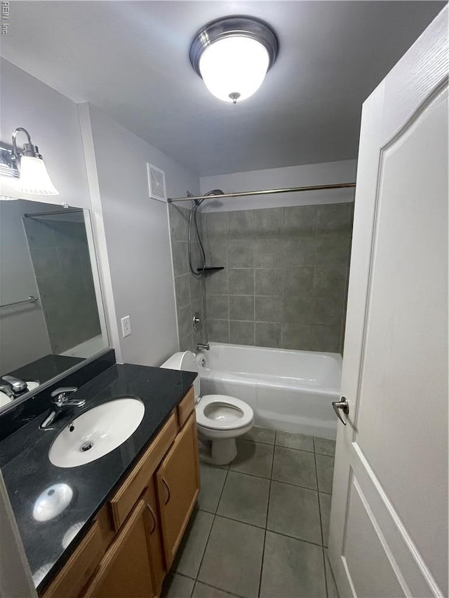 249 W Freemason St Unit 405, Norfolk, VA 23510 - bathroom featuring tile patterned flooring, vanity, toilet, and tub / shower combination