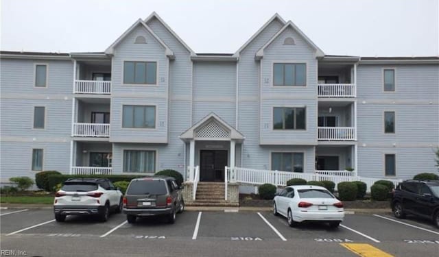 1 Sandy Point Ln Unit 218, Chesapeake, VA 23320 - view of building exterior with uncovered parking
