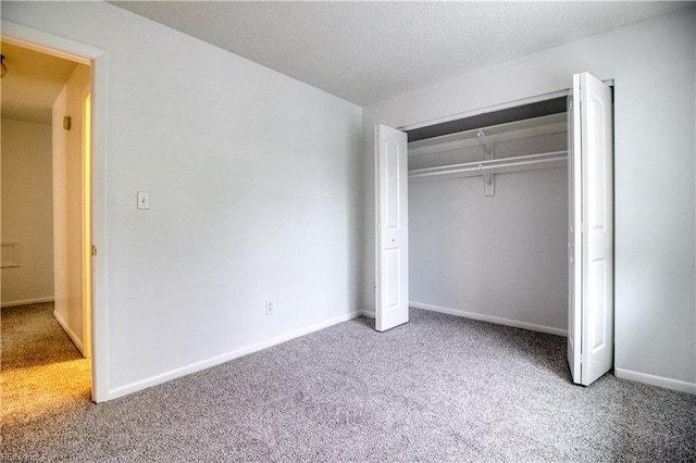 2574 Cove Point Pl, Virginia Beach, VA 23454 - unfurnished bedroom featuring carpet, baseboards, and a closet