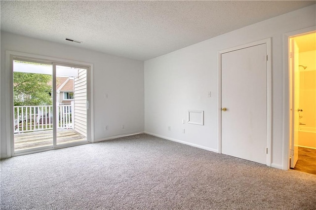 2574 Cove Point Pl, Virginia Beach, VA 23454 - spare room featuring carpet flooring, a textured ceiling, and baseboards